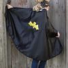 Capa reversible araña/murciélago
